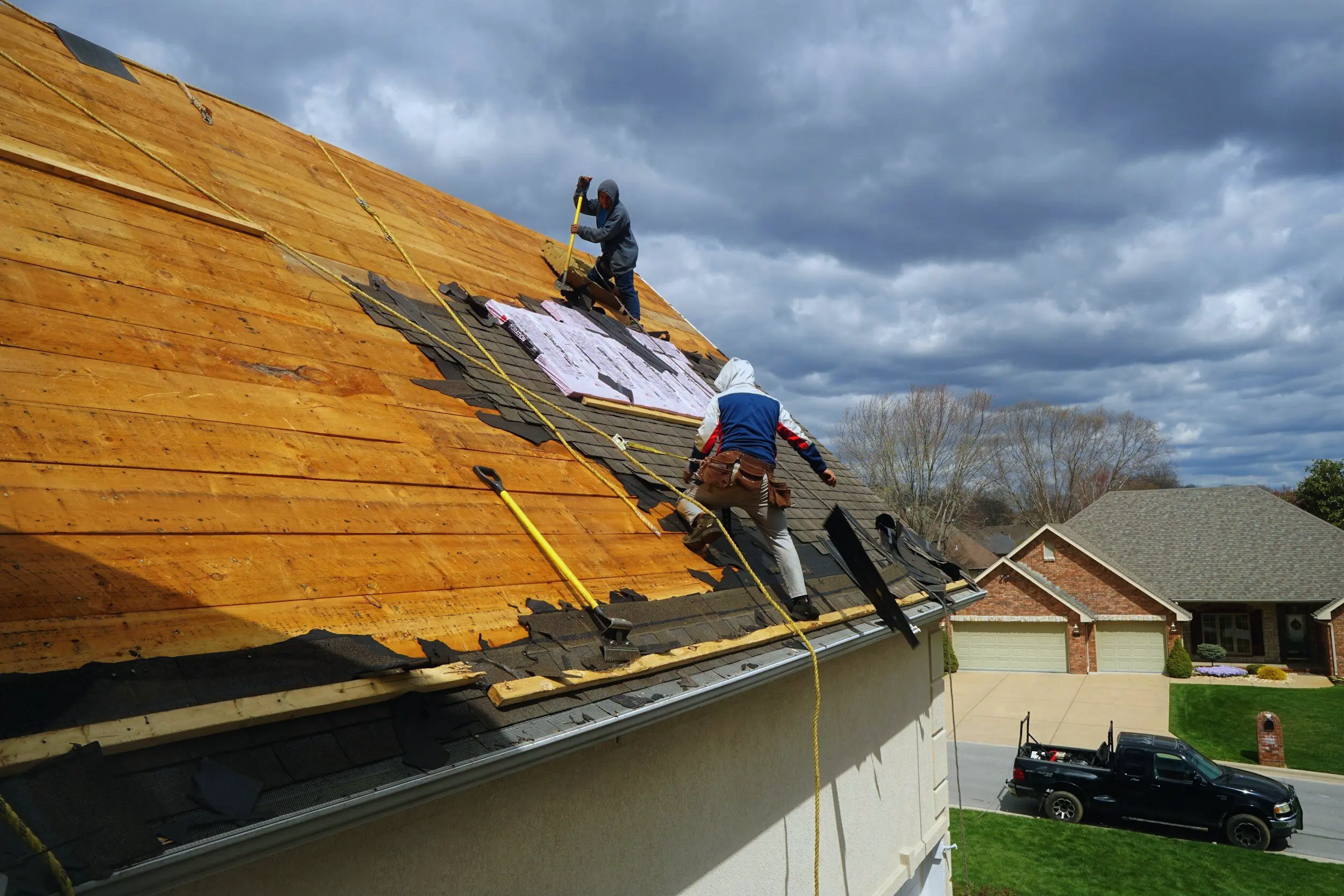 Construction workers on a roof